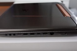 The ASUS ROG G752 laptop, which does not feature the GTX 1080m, is placed on a table