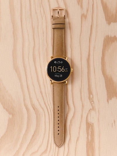 The Fossil Q Wander has a round touchscreen display paired with a classic leather strap.