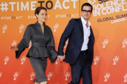 UN Special Envoy and actress Angelina Jolie and Actor Brad Pitt attend the Global Summit to End Sexual Violence in Conflict at ExCel on June 13, 2014 in London, England.   