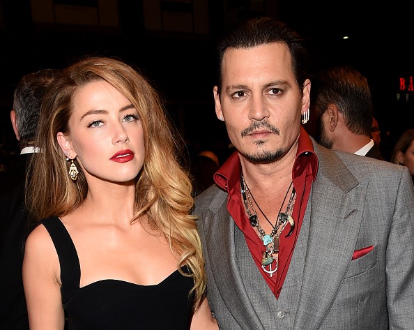 Amber Heard and Johnny Depp attend the 'Black Mass' premiere during the 2015 Toronto International Film Festival at The Elgin on September 14, 2015 in Toronto, Canada.
