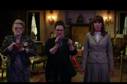 The characters of Kate McKinnon, Melissa McCarthy and Kristen Wiig encounter a ghost in a scene of the 