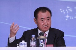 Wanda's Wang Jianlin unveils first of 15 theme parks that could compete with Shanghai Disneyland.