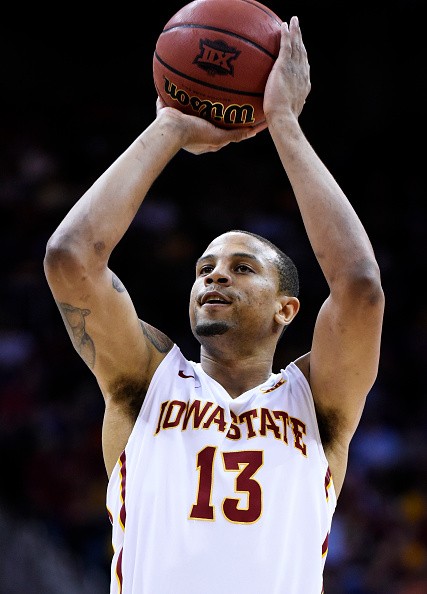 Bryce Dejean-Jones  shoots against the Oklahoma Sooners in the first half during a semifinal game of the 2015 Big 12 Basketball Tournament at Sprint Center on March 13, 2015 in Kansas City, Missouri.
