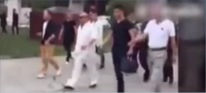 A screengrab of the video showing gangster Cheng Youzhe being accompanied by fellow gang members after being released from prison.