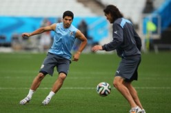 Uruguay strikers Luis Suárez (L) and Edinson Cavani.