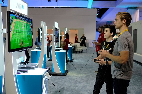 Expo attendees playing Wii U game