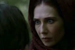 Melisandre (Carice van Houten) looks into Arya Stark's (Maisie Williams) eyes in a scene of 