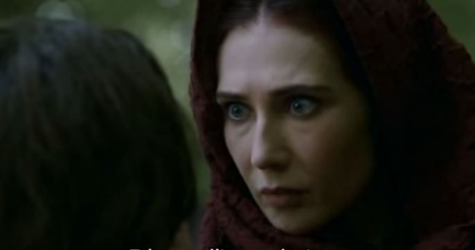 Melisandre (Carice van Houten) looks into Arya Stark's (Maisie Williams) eyes in a scene of "Game of Thrones."   