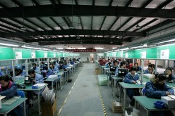 Chinese factories struggle as laborers are replaced by robots.