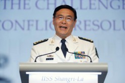 Chinese Admiral Sun Jianguo speaks before delegates at the IISS Shangri-La Dialogue in Singapore on June 5.