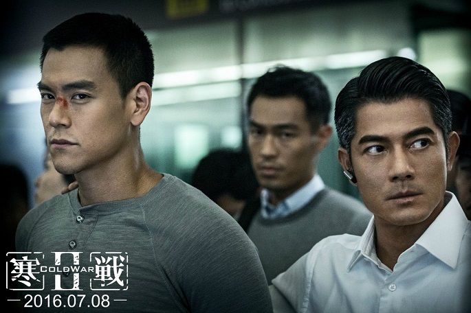 It seems someone gets apprehended: (R) Deputy Commissioner Sean Lau (Aaron Kwok) walks behind Police Constable Joe K.C. Lee (Eddie Peng) from a still from the film "Cold War 2."