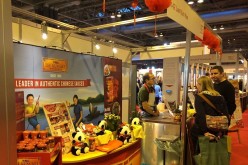 A couple of visitors check out the Lee Kum Kee booth during a 2015 food fair abroad.