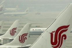 Planes of Air China dock on the tarmac at Beijing Capital International Airport, one of the busiest in the world.