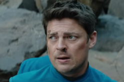 Doctor Leonard McCoy (Karl Urban) faces danger with Spock (Zachary Quinto) in a scene of 