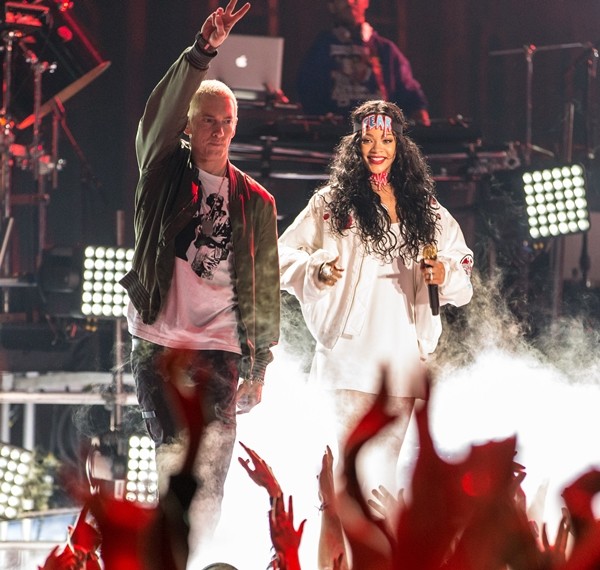 'Love the Way You Lie' collaborators Eminem and Rihanna perform onstage at the 2014 MTV Movie Awards at Nokia Theatre L.A. Live on April 13, 2014 in Los Angeles, California. 