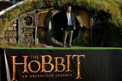 tor Peter Jackson emerges from from a Hobbit house before delivering a speech at the 'The Hobbit: An Unexpected Journey' World Premiere at Embassy Theatre on November 28, 2012 in Wellington, New Zealand.