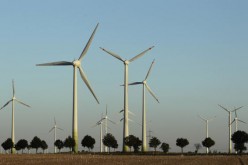 Wind turbines spin to produce electricity on Aug. 20, 2010, in Roedgen near Bitterfeld, Germany.