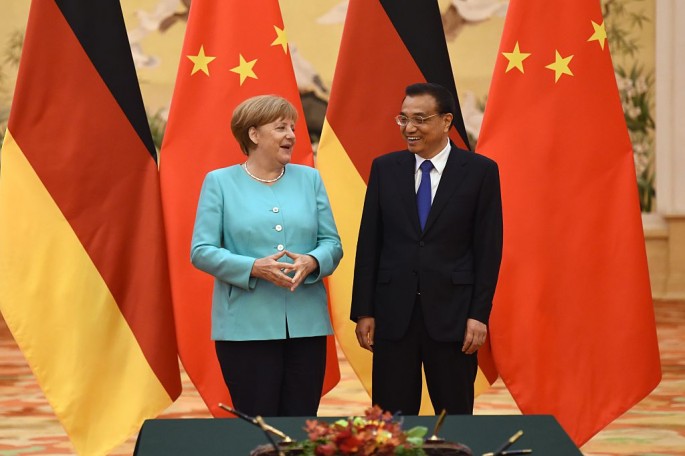 Chinese Premier Li Keqiang holds a joint press conference with German Chancellor Angela Merkel in Beijing.