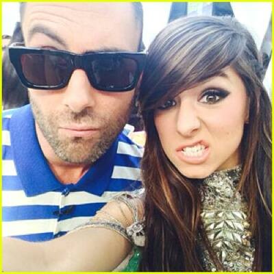 "The Voice" coach Adam Levine poses with Christina Grimmie during the singing competition.