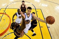 Stephen Curry #30 of the Golden State Warriors goes up for a shot against LeBron James #23 of the Cleveland Cavaliers in the first half in Game 2 of the 2016 NBA Finals at ORACLE Arena on June 5, 2016 in Oakland, California.