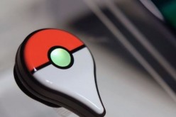 The Pokemon GO Plus companion device is displayed 