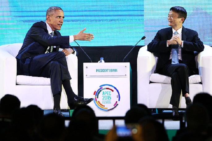 U.S. President Barack Obama gestures as he talks to Alibaba CEO Jack Ma during the Asia-Pacific Economic Cooperation (APEC) CEO Summit in Manila, Philippines, on Nov. 18, 2015.