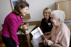 Queen Silvia of Sweden talks to inpatient Margarete Weier, 79, during the opening of the first German section in a hospital for dementia patients  on October 17, 2009 in Cologne, Germany. 