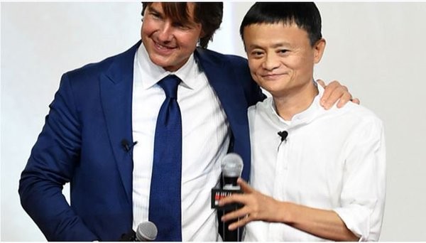 Alibaba founder Jack Ma with actor Tom Cruise. The company denied that it is buying Paramount Pictures despite being one of the major investors for Cruise's film "Mission Impossible: Rogue Nation."
