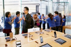Apple store employees welcome the customers to buy iPhone 6 and iPhone 6 Plus at an Apple store on Oct. 17, 2014 in Beijing, China. 