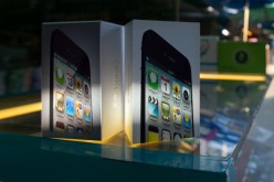 Fake iPhone packaging is displayed on a stall at an outdoor market selling counterfeit Chinese made items in the Golden Triangle, situated along the Thai- Burma border on Nov. 12, 2012 in Tachiliek, Myanmar. 
