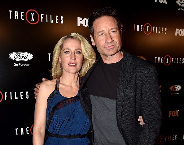Actress Gillian Anderson and actor David Duchovny arrive at the premiere of Fox's 'The X-Files' at the California Science Center on January 16, 2106 in Los Angeles, California.