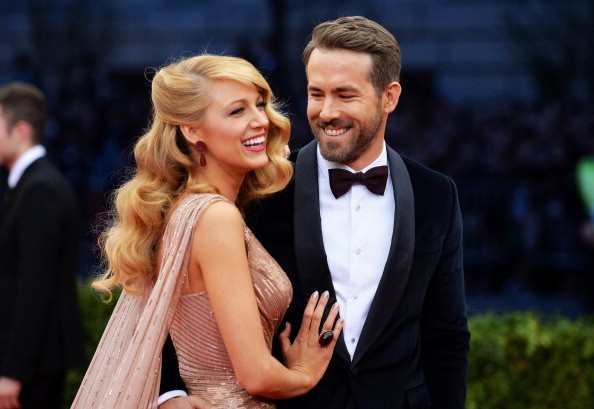 Actors Blake Lively (L) and Ryan Reynolds attend the 'Charles James: Beyond Fashion' Costume Institute Gala at the Metropolitan Museum of Art on May 5, 2014 in New York City.