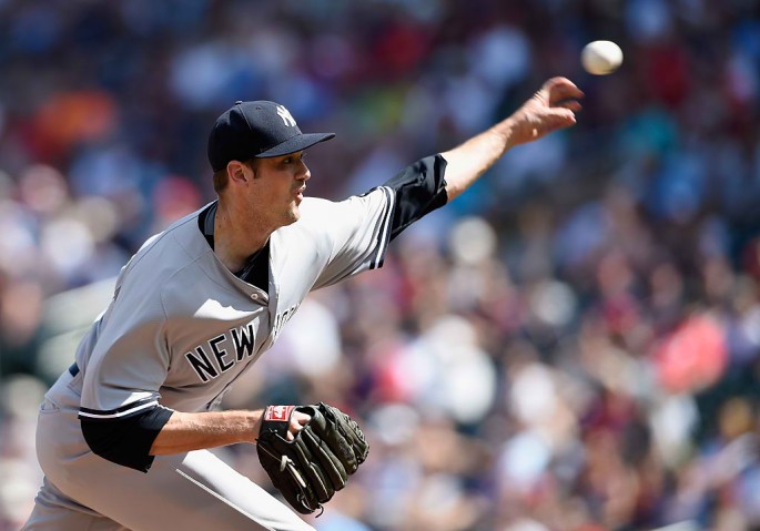 Andrew Miller #48 of the New York Yankees delivers a pitch against the Minnesota Twins during the eighth inning of the game on June 18, 2016 at Target Field in Minneapolis, Minnesota. The Yankees defeated the Twins 7-6.