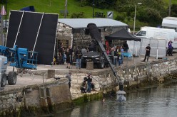 Maisie Williams, who plays Ayra Stark on “Game of Thrones,” is filmed during a water scene for the new series on Aug. 17, 2015 in Carnlough, Northern Ireland. 