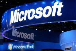 The Microsoft logo is displayed over the Microsoft booth at the 2010 International Consumer Electronics Show at the Las Vegas Hilton Jan. 7, 2010 in Las Vegas, Nevada. 
