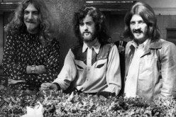 Three of the four members of British heavy rock group Led Zeppelin, singer Robert Plant, guitarist Jimmy Page and drummer John Bonham pose for a photo in Embankment Gardens, London on Sept. 16, 1970. 