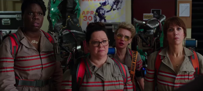 "Ghostbusters" stars (l-r) Leslie Jones, Melissa McCarthy, Kate McKinnon and Kristen Wiig listen to ghost stories in a scene of the upcoming film.    