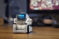 Anki's Cozmo robot looks up to its owner