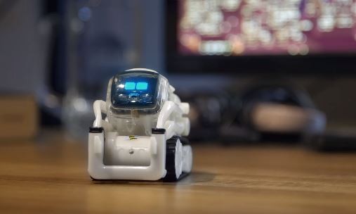 Anki's Cozmo robot looks up to its owner