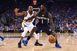 Former Memphis Grizzlies wingman Lance Stephenson being guarded by Golden State Warriors' Andre Iguodala.
