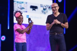 Mikaila Ulmer and Microsoft CEO Satya Nadella speak on stage during “We Day” at KeyArena on April 20, 2016 in Seattle, Washington. 