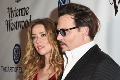 Actors Amber Heard (L) and Johnny Depp attend The Art of Elysium 2016 HEAVEN Gala presented by Vivienne Westwood & Andreas Kronthaler at 3LABS on January 9, 2016 in Culver City, California.