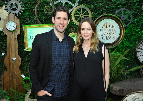 John Krasinski (L) and Emily Blunt attend Disney's Alice Through the Looking Glass event on May 12, 2016 at Roseark in Los Angeles California.
