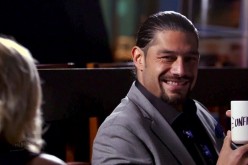 Roman Reings smiles during his appearance on WWE Unfiltered hosted by Renee Young.