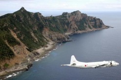 A Japanese surveillance plane flies over the disputed islands in East China Sea.