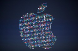 The Apple logo is projected on the screen at an Apple event at the Worldwide Developer's Conference on June 13, 2016 in San Francisco, California. 