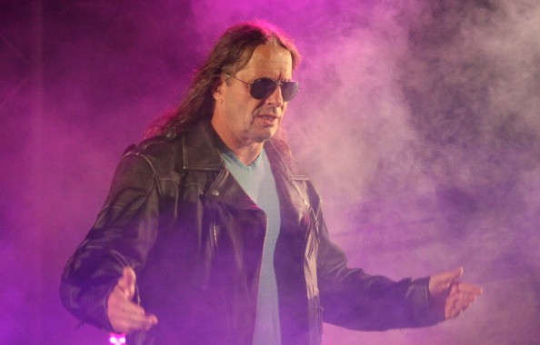 Bret Hart poses during his entrance at a WWE Live Event in Durban, South Africa.