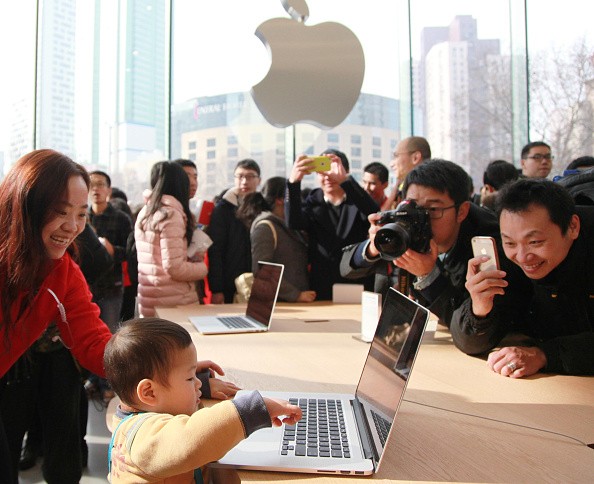 Customers experience Apple products as Nanjing opens second Apple Store on Jan. 16, 2016 in Nanjing, Jiangsu Province of China. 
