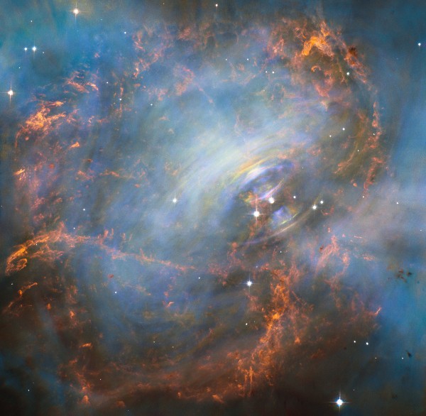 The violent heart of the Crab Nebula located 6,500 light years away.