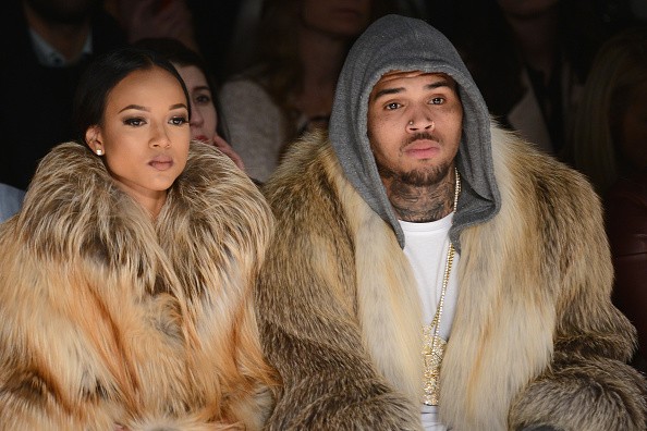 Karrueche Tran (L) and Chris Brown attends the Michael Costello fashion show during Mercedes-Benz Fashion Week Fall 2015 at The Salon at Lincoln Center on February 17, 2015 in New York City